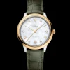 34 mm, acciaio‑oro giallo su cinturino di pelle