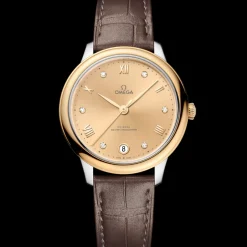 34 mm, acciaio‑oro giallo su cinturino di pelle