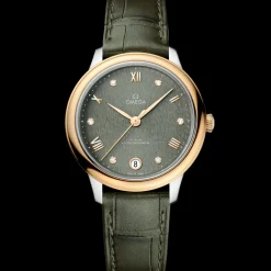 34 mm, acciaio‑oro giallo su cinturino di pelle