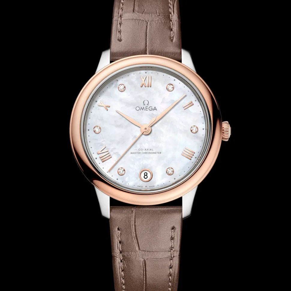 34 mm, acciaio‑oro Sedna™ su cinturino di pelle