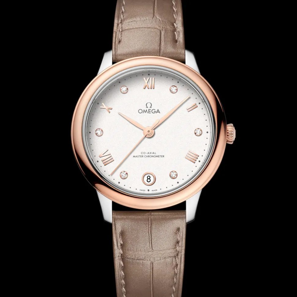 34 mm, acciaio‑oro Sedna™ su cinturino di pelle