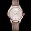 34 mm, acciaio‑oro Sedna™ su cinturino di pelle