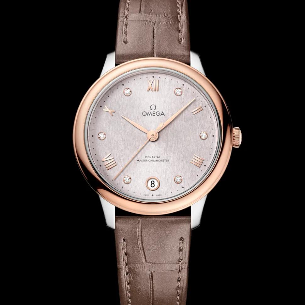 34 mm, acciaio‑oro Sedna™ su cinturino di pelle