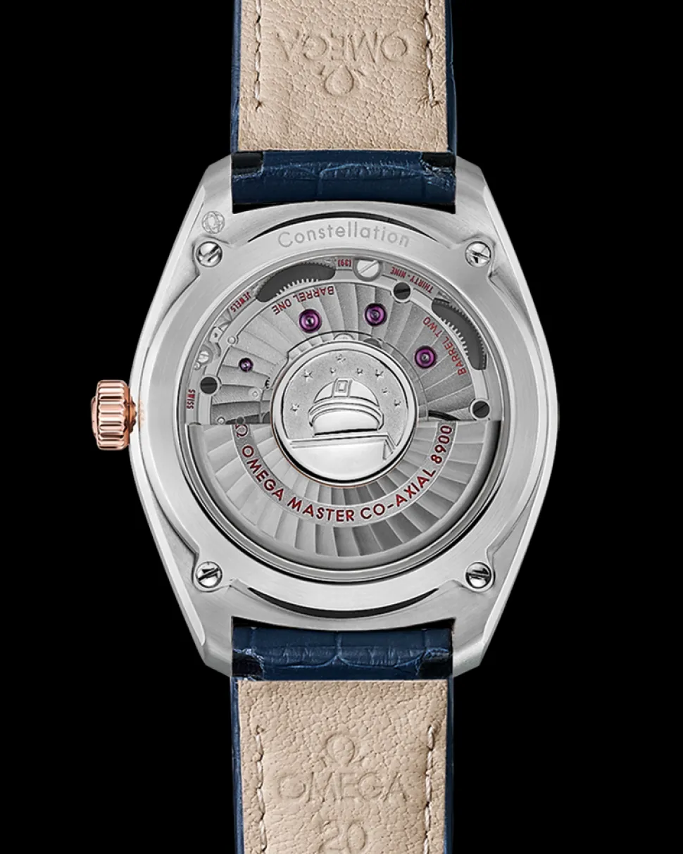 39 mm, acciaio‑oro Sedna™ su cinturino di pelle