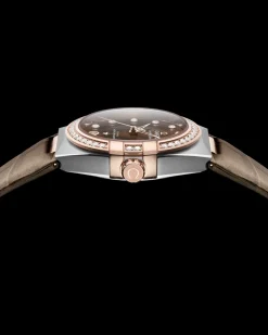 36 mm, acciaio‑oro Sedna™ su cinturino di pelle