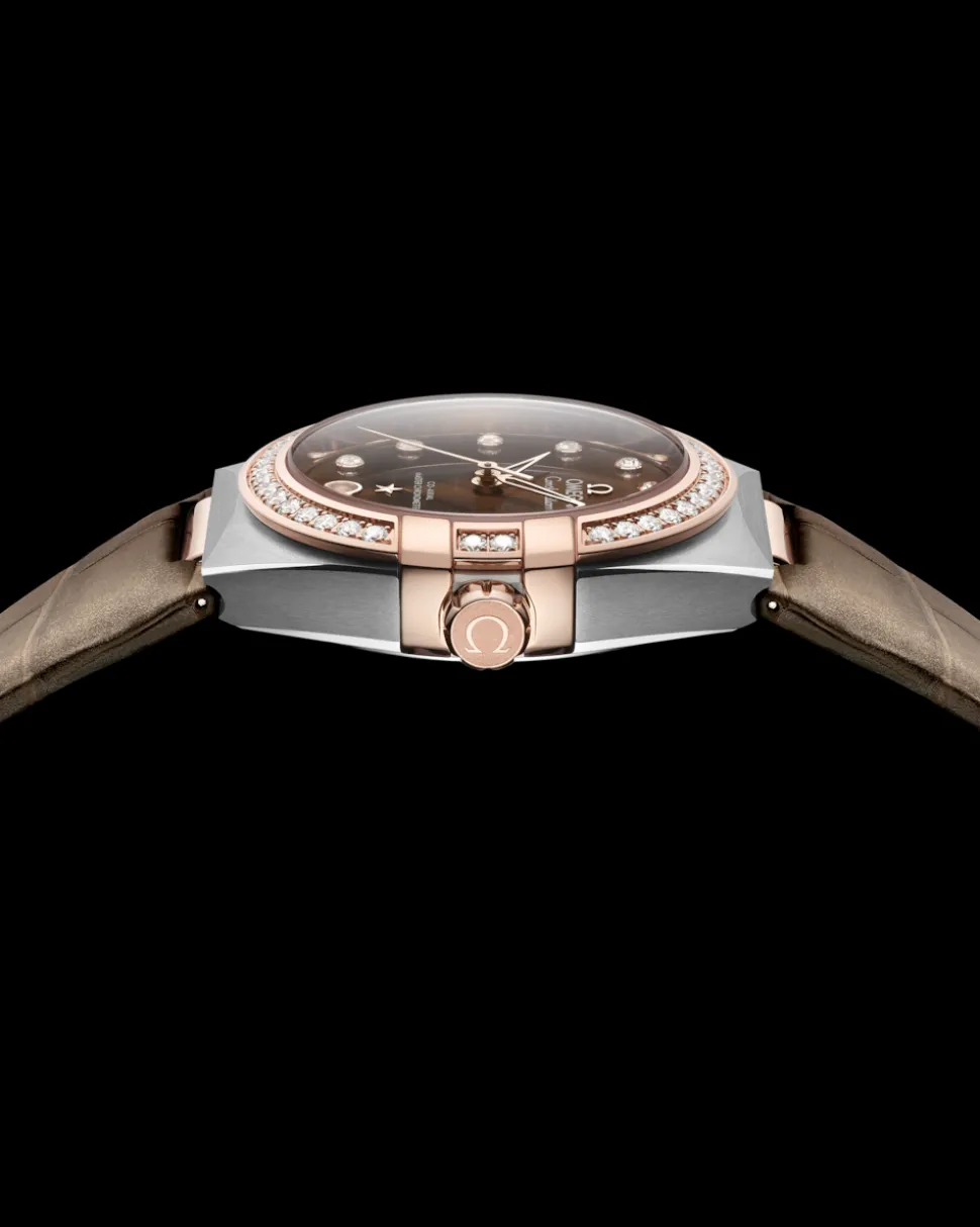 36 mm, acciaio‑oro Sedna™ su cinturino di pelle
