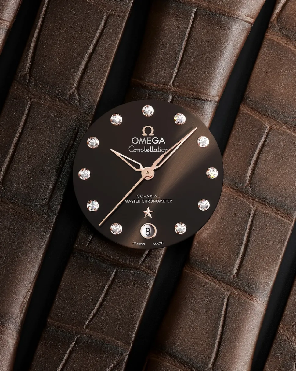 36 mm, acciaio‑oro Sedna™ su cinturino di pelle