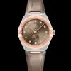 34 mm, acciaio‑oro Sedna™ su cinturino di pelle