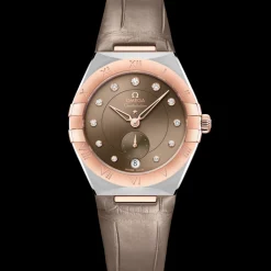 34 mm, acciaio‑oro Sedna™ su cinturino di pelle
