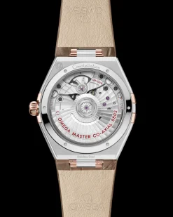 34 mm, acciaio‑oro Sedna™ su cinturino di pelle