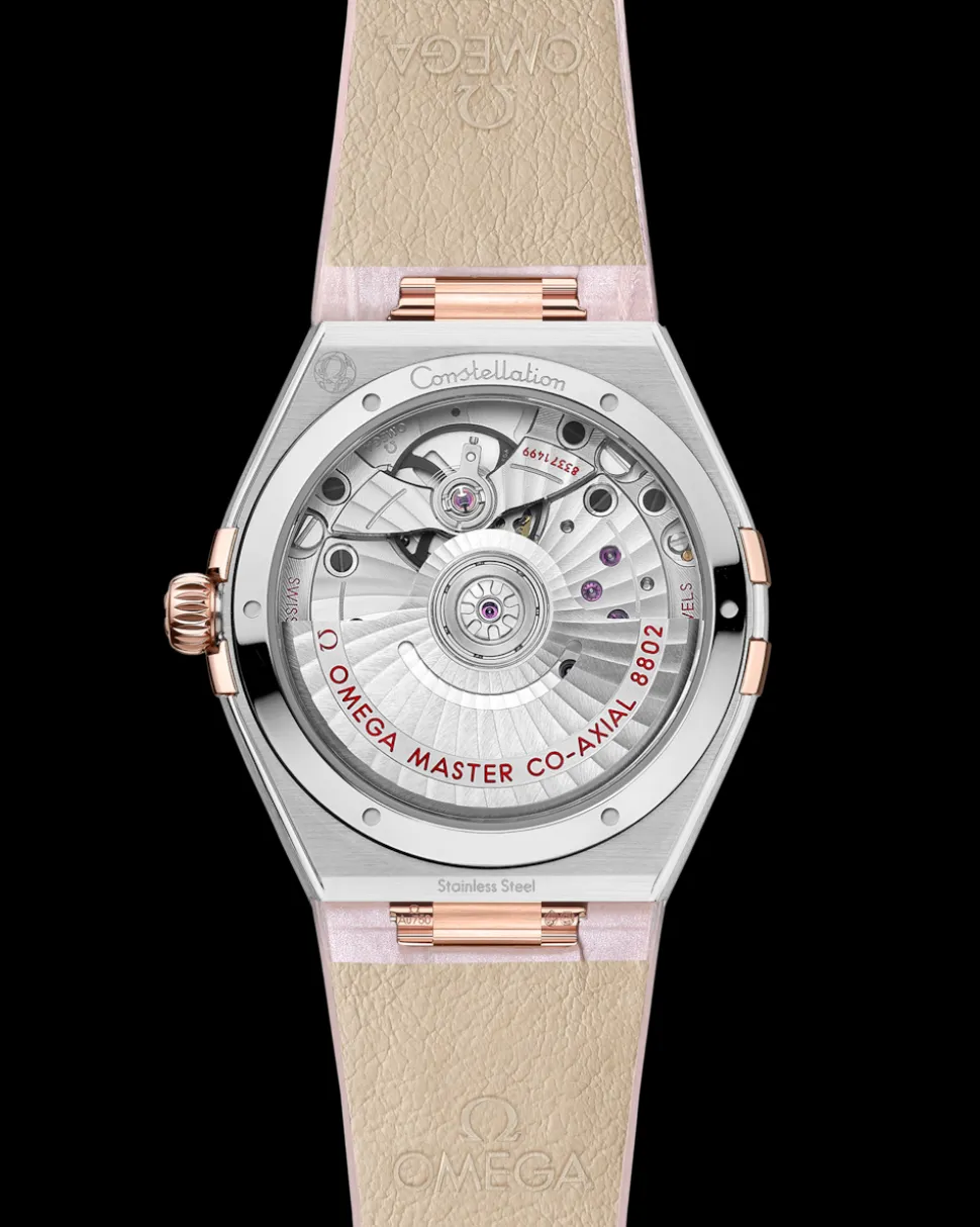 34 mm, acciaio‑oro Sedna™ su cinturino di pelle