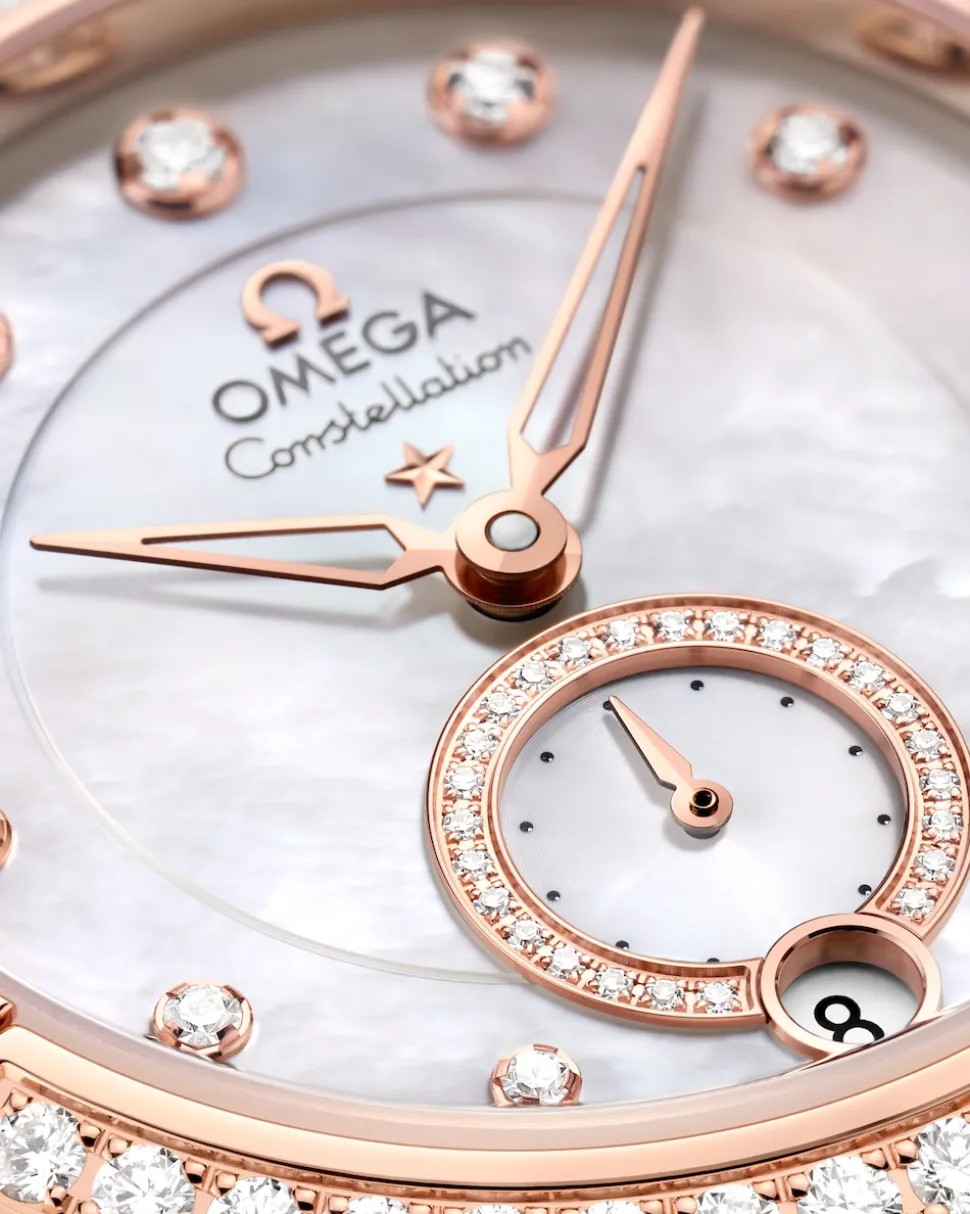 34 mm, acciaio‑oro Sedna™ su cinturino di pelle