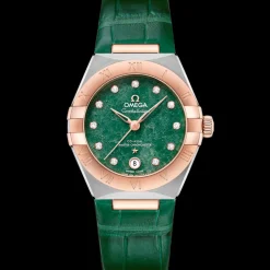 29 mm, acciaio‑oro Sedna™ su cinturino di pelle