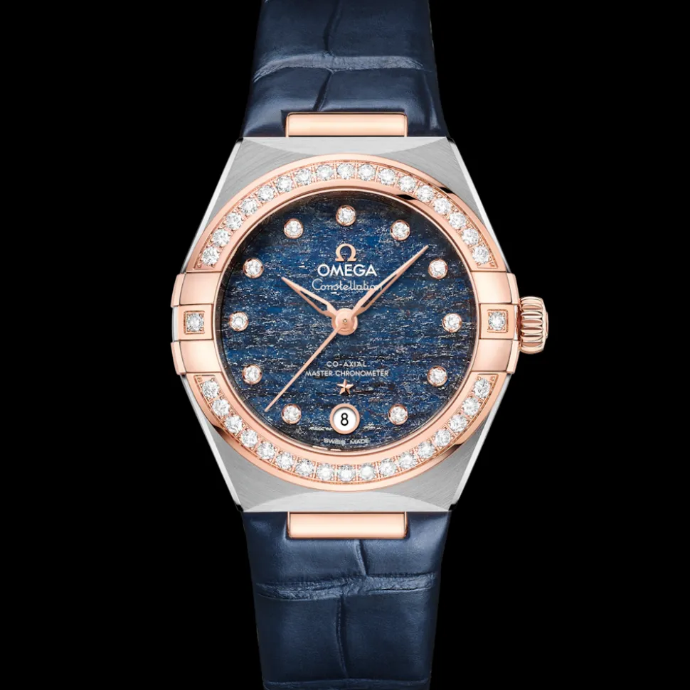 29 mm, acciaio‑oro Sedna™ su cinturino di pelle
