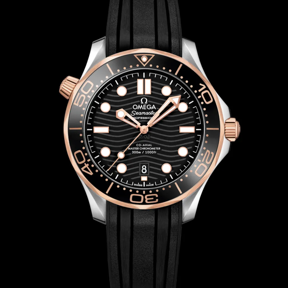 42 mm, acciaio‑oro Sedna™ su cinturino in caucciù