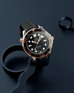 42 mm, acciaio‑oro Sedna™ su cinturino in caucciù