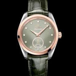 38 mm, acciaio‑oro Sedna™ su cinturino di pelle