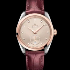 38 mm, acciaio‑oro Sedna™ su cinturino di pelle