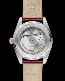 38 mm, acciaio‑oro Sedna™ su cinturino di pelle