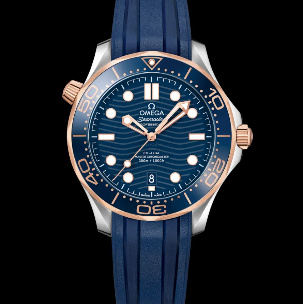 42 mm, acciaio‑oro Sedna™ su cinturino in caucciù