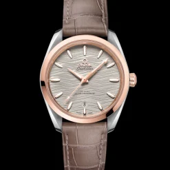 38 mm, acciaio‑oro Sedna™ su cinturino di pelle