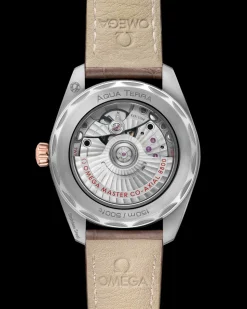 38 mm, acciaio‑oro Sedna™ su cinturino di pelle