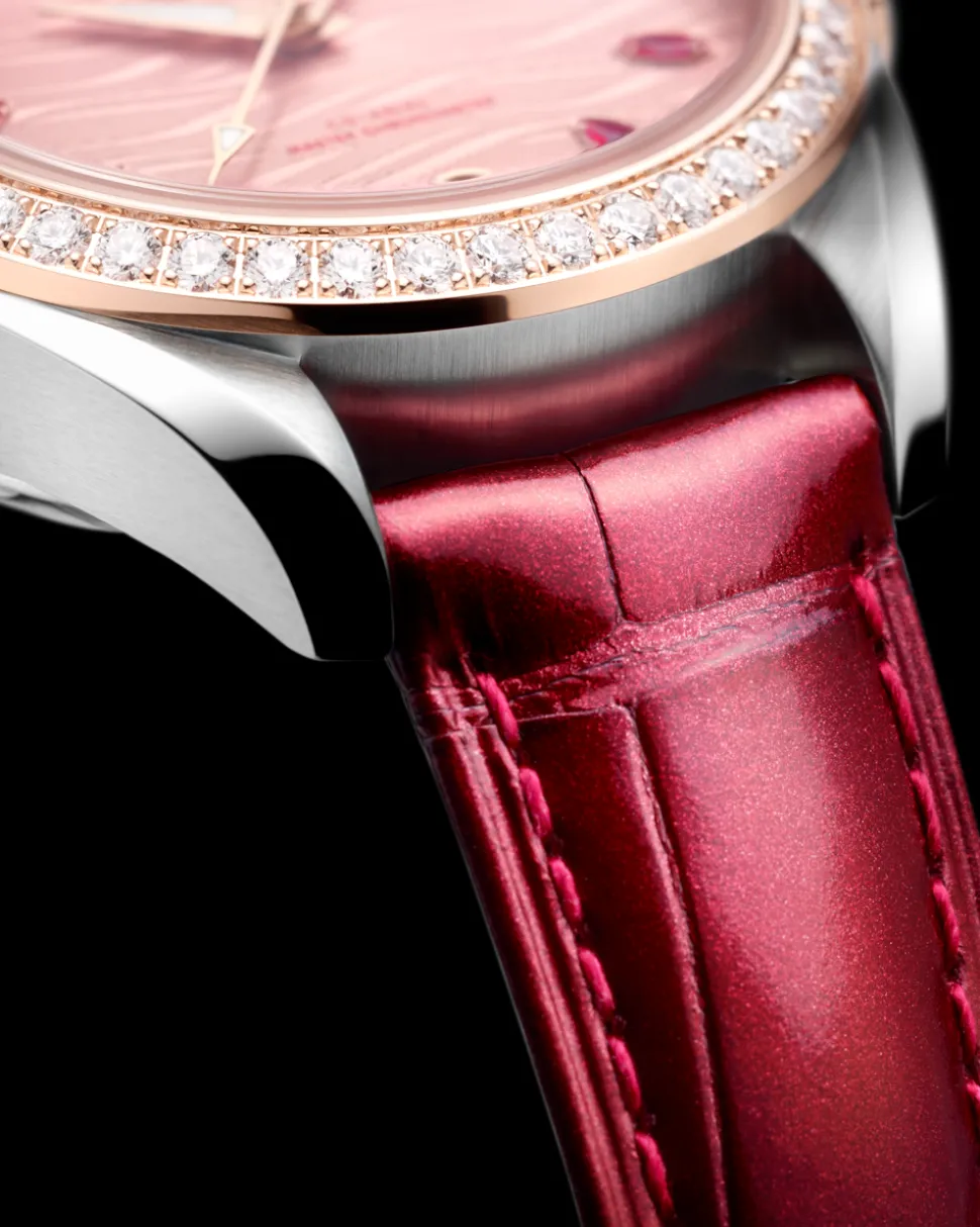 34 mm, acciaio‑oro Sedna™ su cinturino di pelle