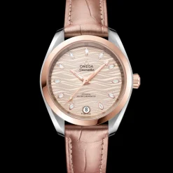 34 mm, acciaio‑oro Sedna™ su cinturino di pelle