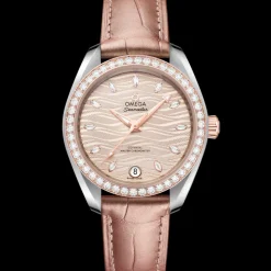 34 mm, acciaio‑oro Sedna™ su cinturino di pelle