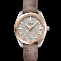 34 mm, acciaio‑oro Sedna™ su cinturino di pelle