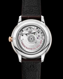 40 mm, acciaio‑oro Sedna™ su cinturino di pelle