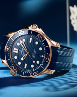 42 mm, oro Sedna™ su cinturino in caucciù