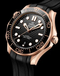 42 mm, oro Sedna™ su cinturino in caucciù
