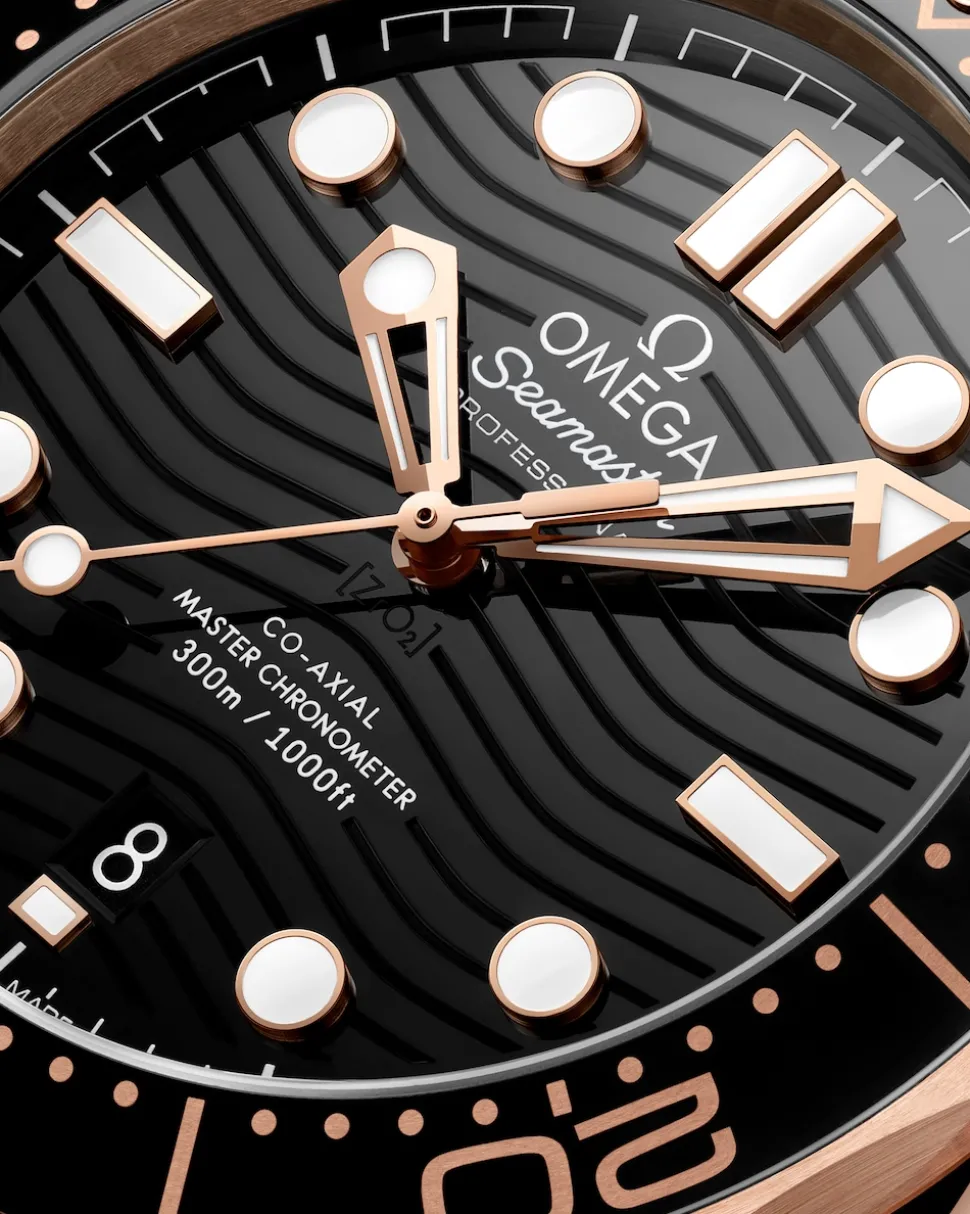 42 mm, oro Sedna™ su cinturino in caucciù