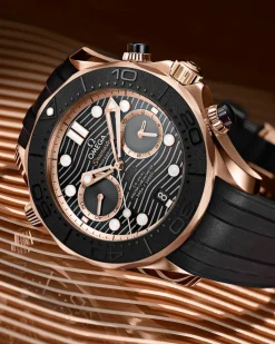 44 mm, oro Sedna™ su cinturino in caucciù