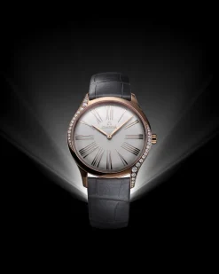 36 mm, oro Sedna™ su cinturino di pelle